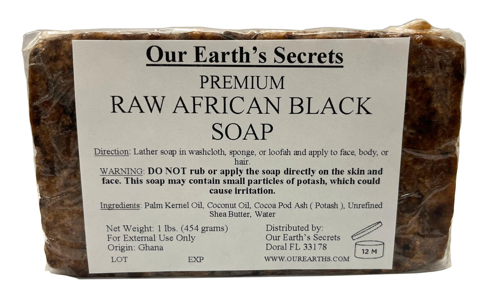 Our Earth's Secrets raw African black soap bar; natural cleansing texture.