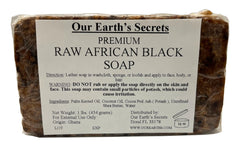 Our Earth's Secrets raw African black soap bar; natural cleansing texture.