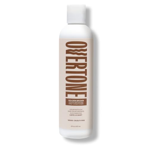 Cette image montre la texture crème de oVertone prête à être appliquée sur les cheveux.