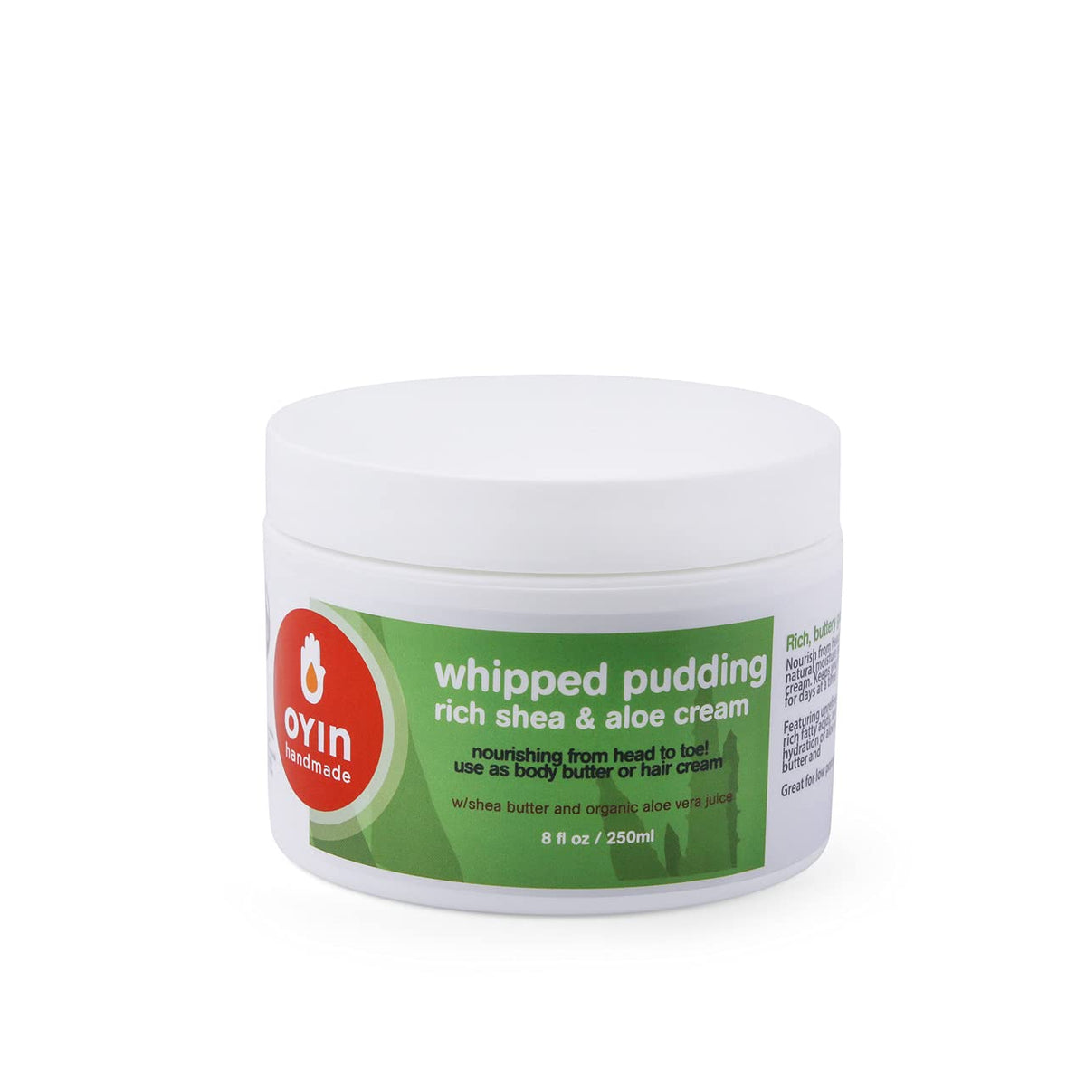 Oyin Handmade Whipped Pudding dans son pot, texture riche prête à l'hydratation quotidienne.