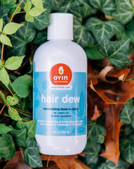 Texture crémeuse d'Oyin Handmade pour revitaliser les cheveux secs.