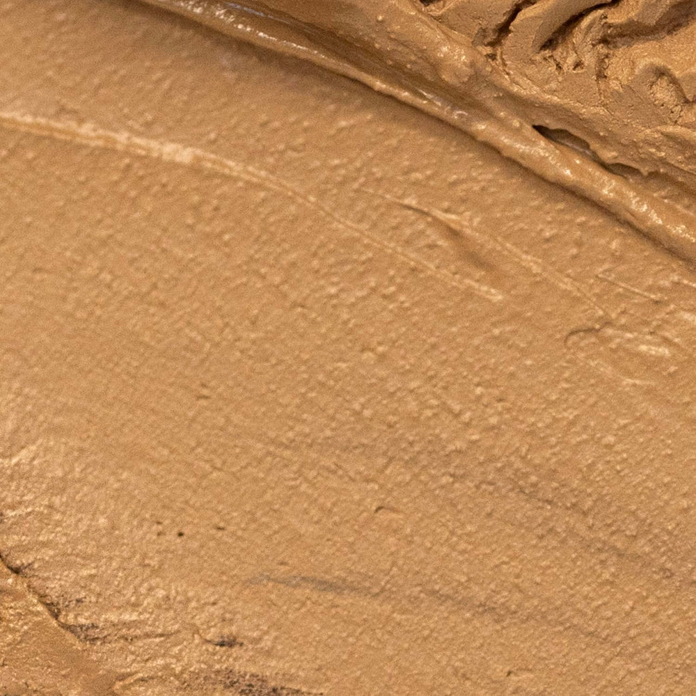 Palladio Cream Bronzer met en valeur les pommettes avec un éclat bronze subtil.