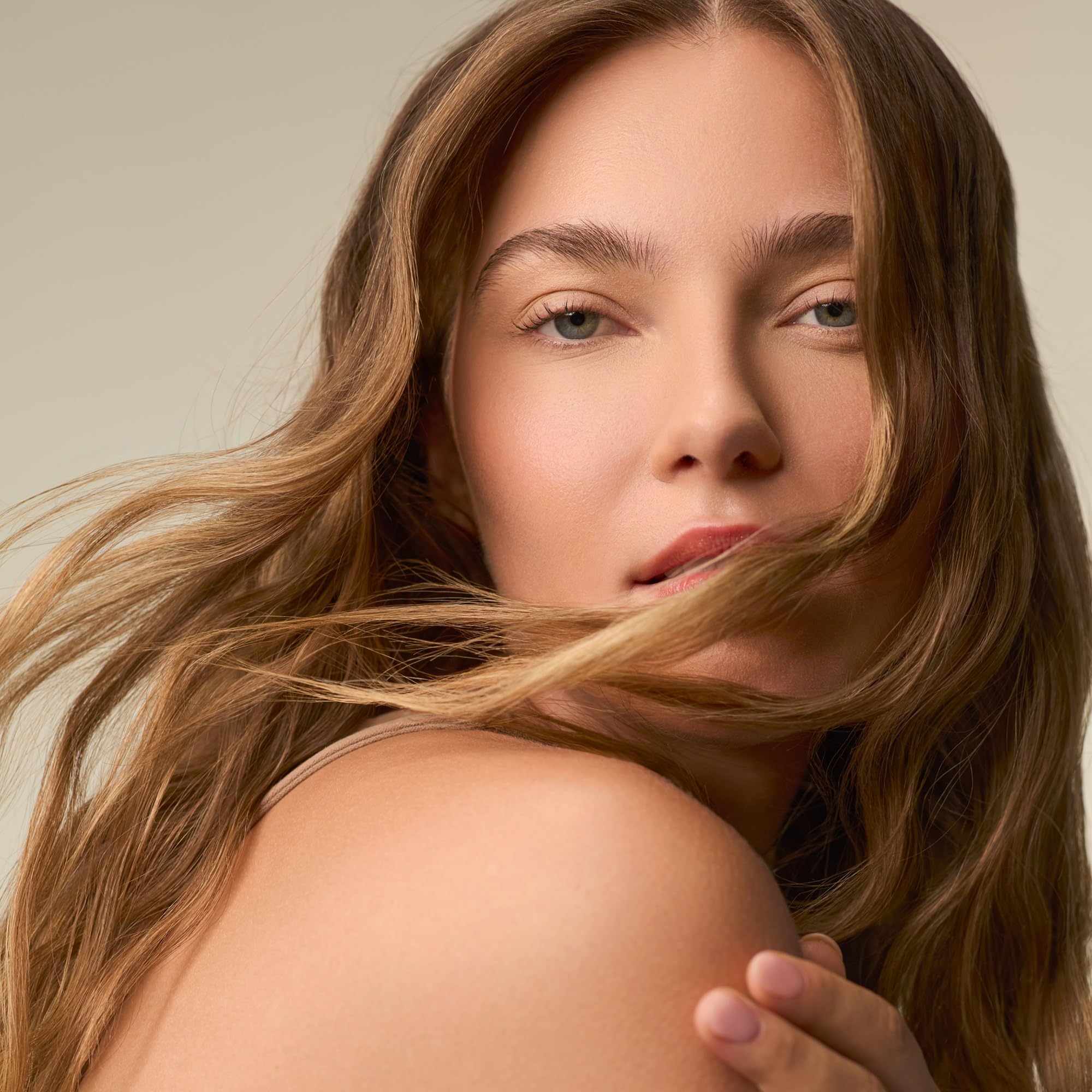 Cheveux demeles et brillants apres rinçage grace au masque.