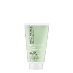 Paul Mitchell Clean Beauty, flacon du traitement anti-frizz, lissant les frisottis pour cheveux texturés.