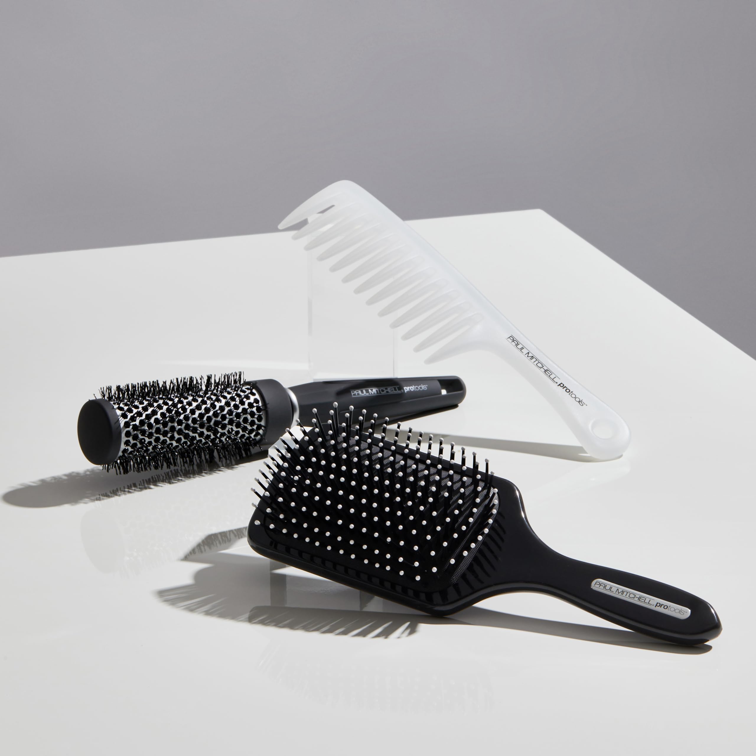 Paul Mitchell Express Ion: astuce stylistique pour volume durable grâce au barillet chauffant.
