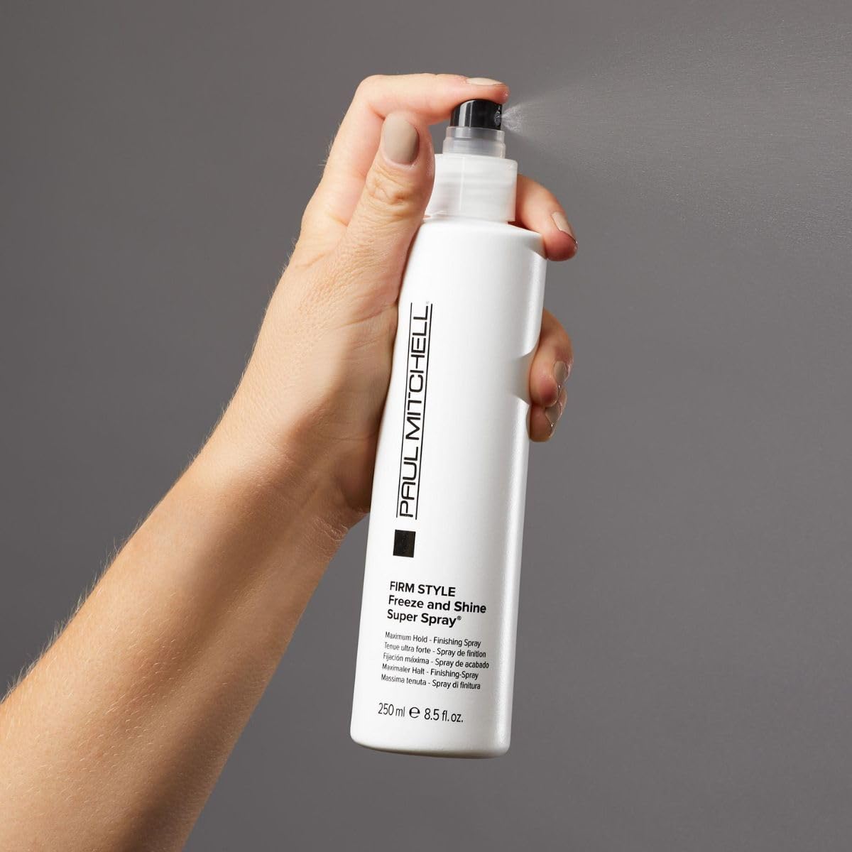 Paul Mitchell Freeze et Brillance – spray non aérosol pour cheveux épais et coiffage précis.
