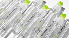 Cheveux brillants et lisses après séchage avec Paul Mitchell Super Skinny Serum.