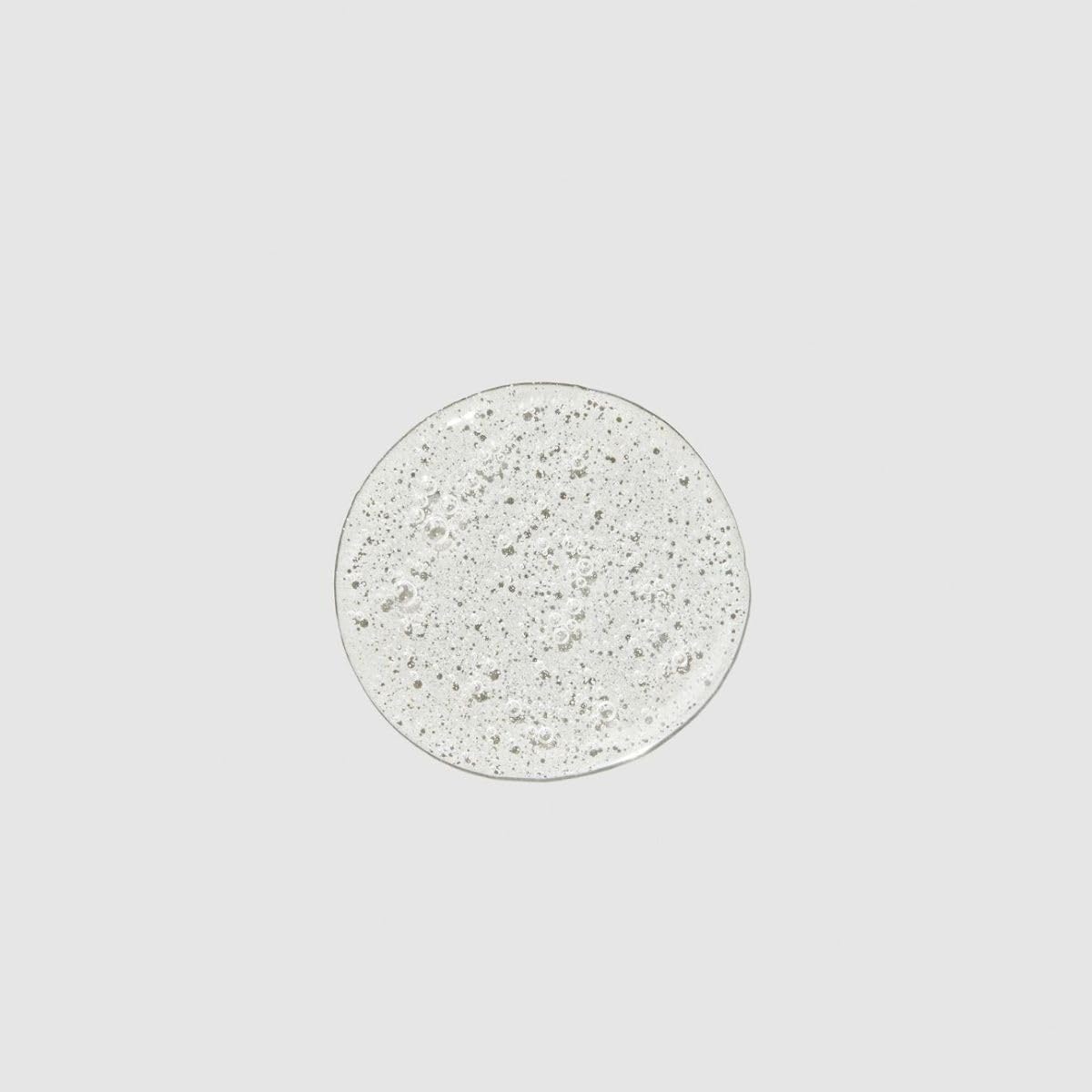 Étiquette du shampooing montrant la formule douce et compatible avec les colorations.