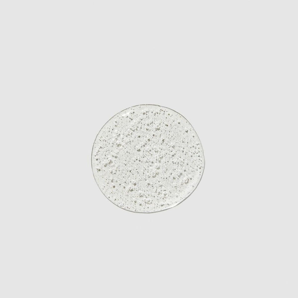Étiquette du shampooing montrant la formule douce et compatible avec les colorations.