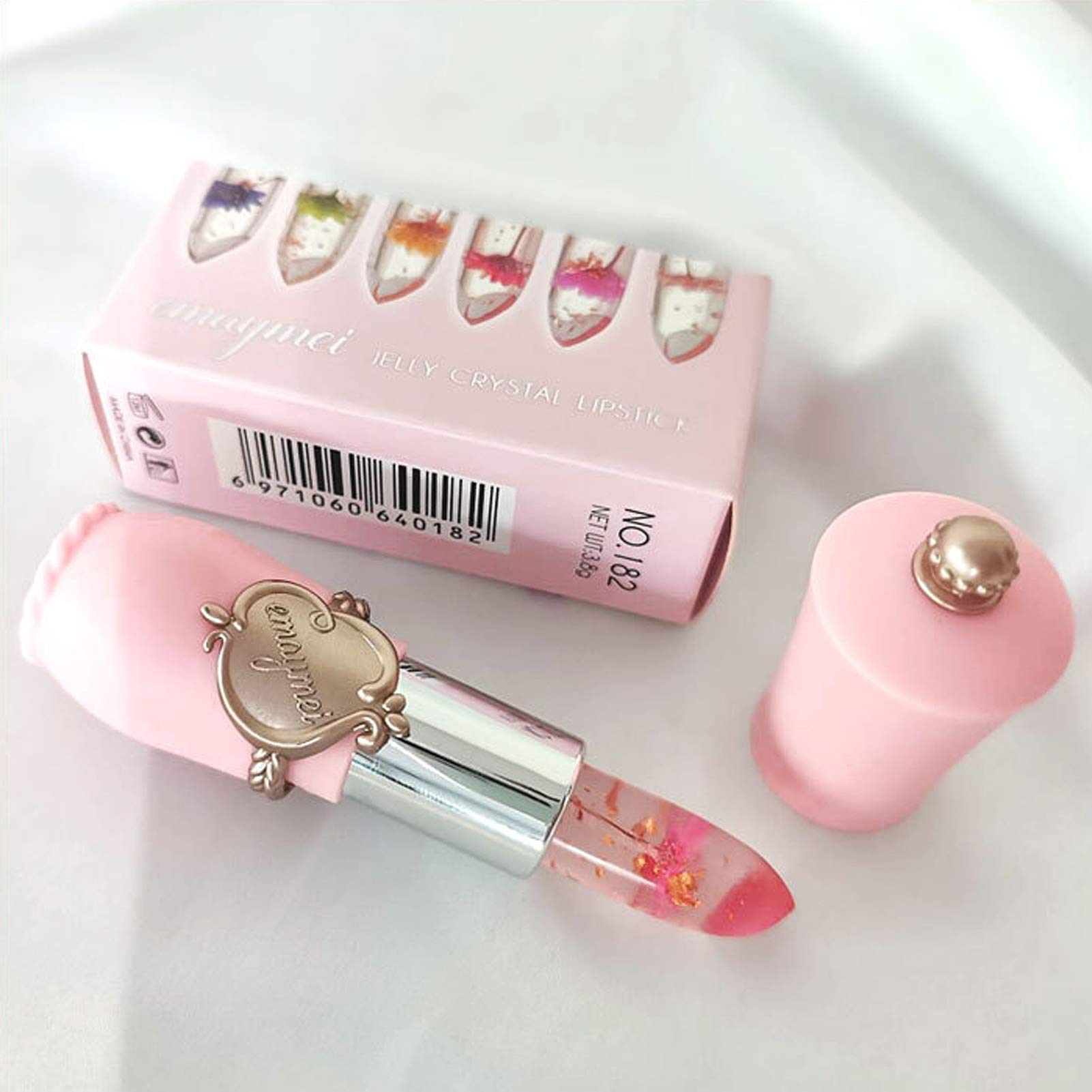 Fleur encapsulée visible dans le tube Petansy pour un look délicat.