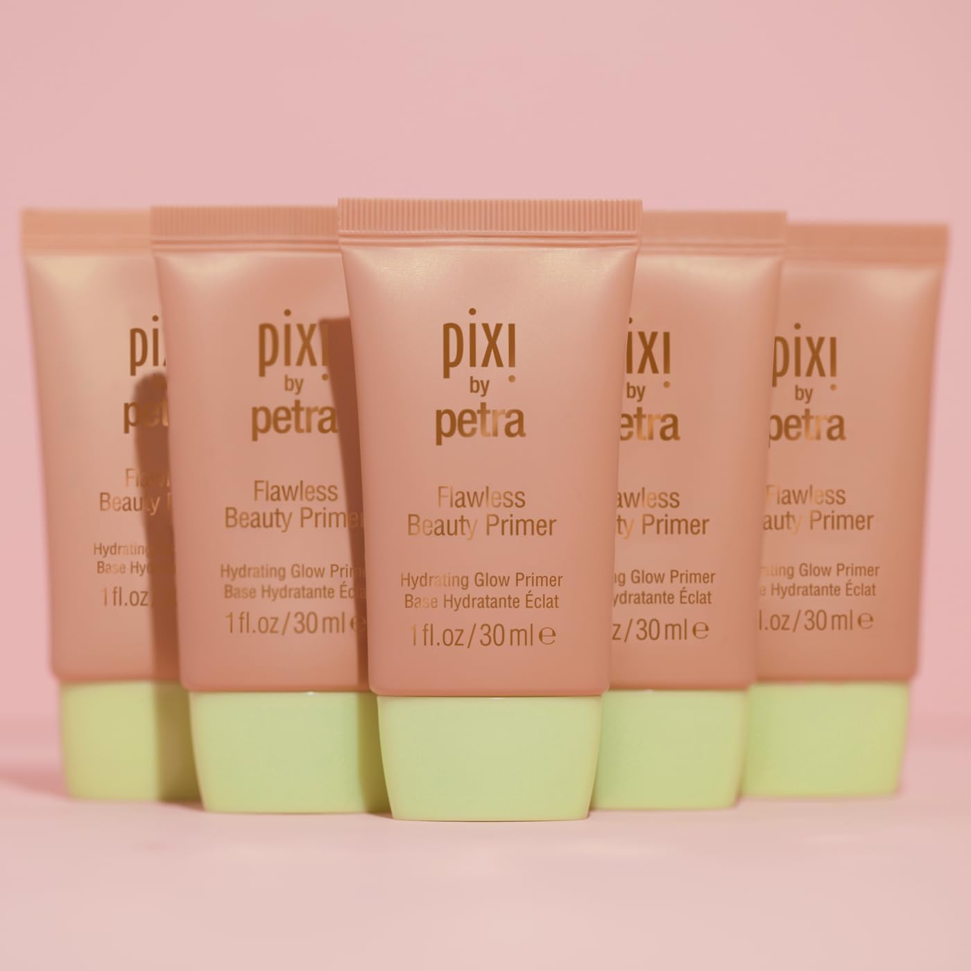 Pixi: fini lustre sur les pommettes et zones clés.