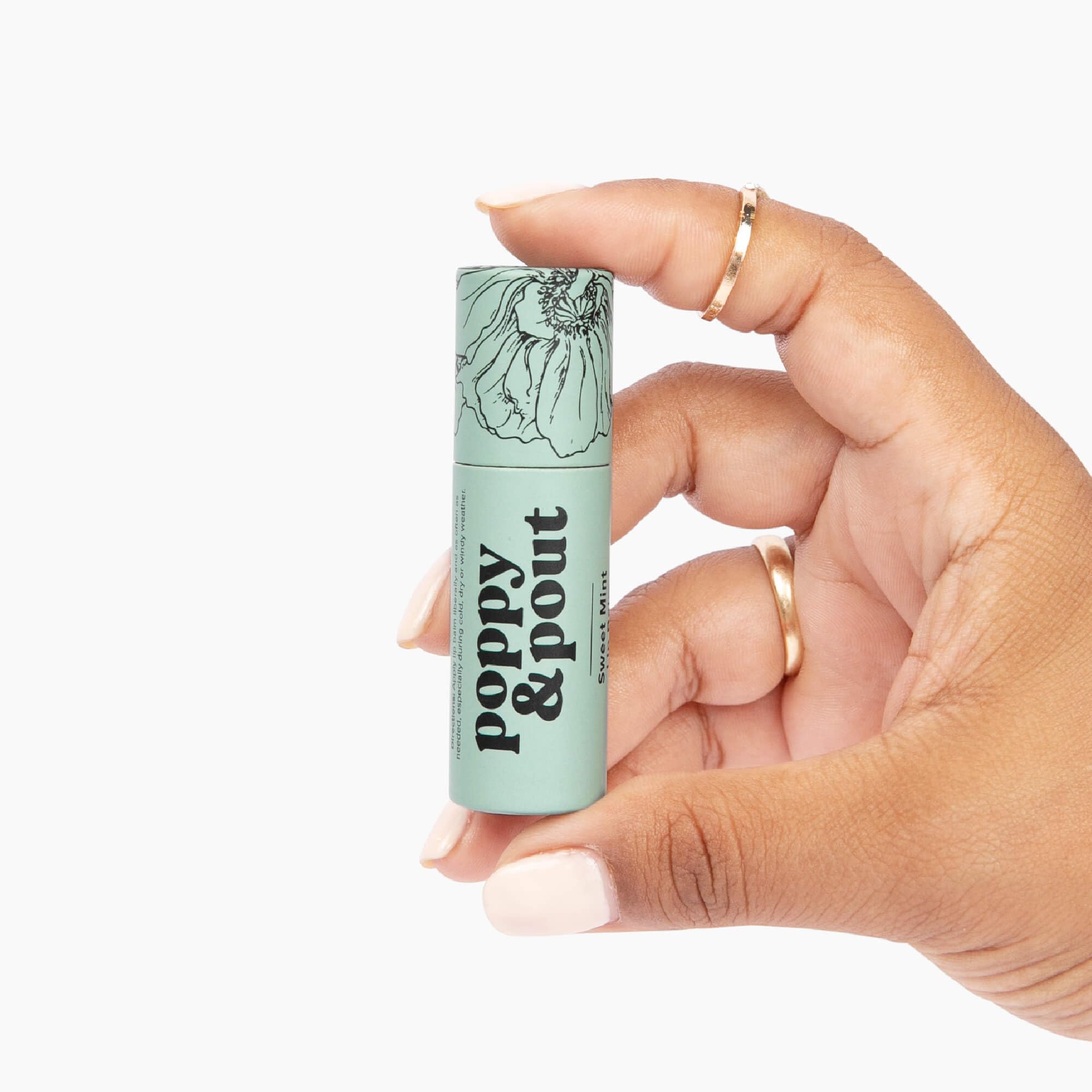Conservation et transport faciles du baume Poppy & Pout Menthe Douce.
