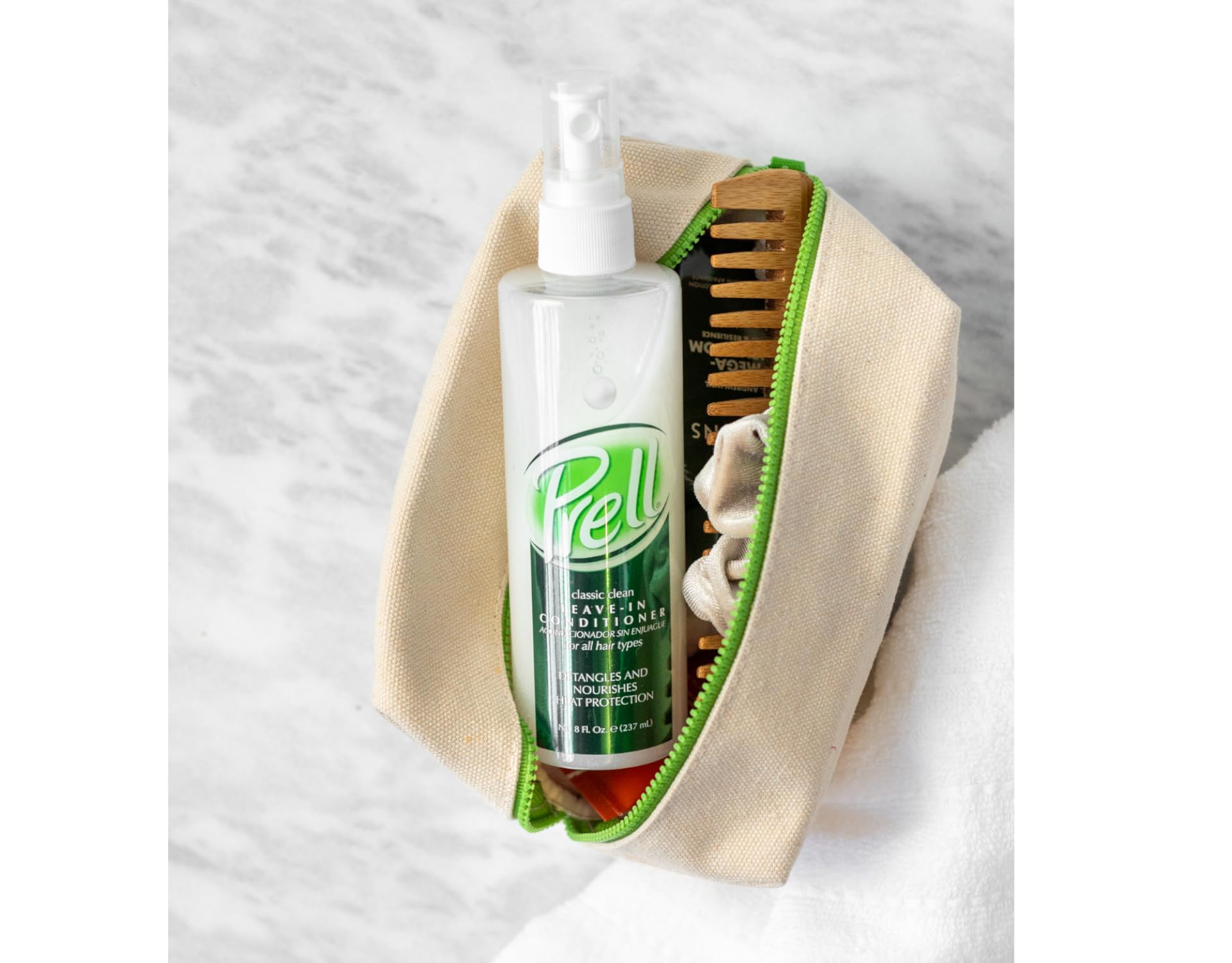 Prell Classic Clean Soin sans rinçage, cheveux démêlés et plus maniables après utilisation.