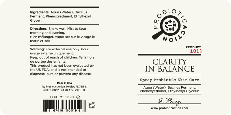 Hands applying Probiotic Action Clarity in Balance spray to face