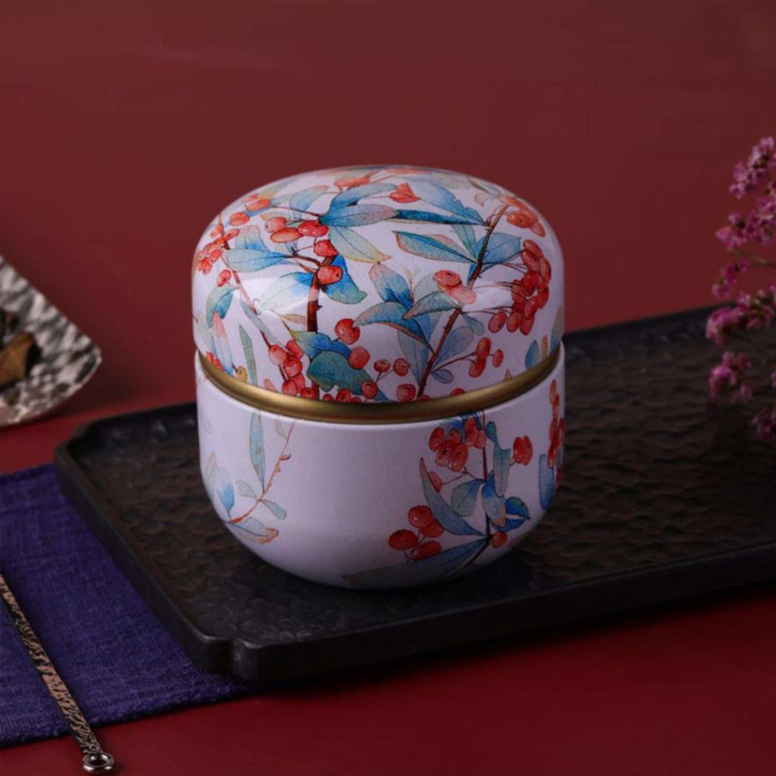 Boîte poudre motif artiste Qopoto, finition chic et fonctionnelle.