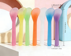 QsQueen spatules cosmétiques – bords arrondis glissant sur la peau sans accrocher.