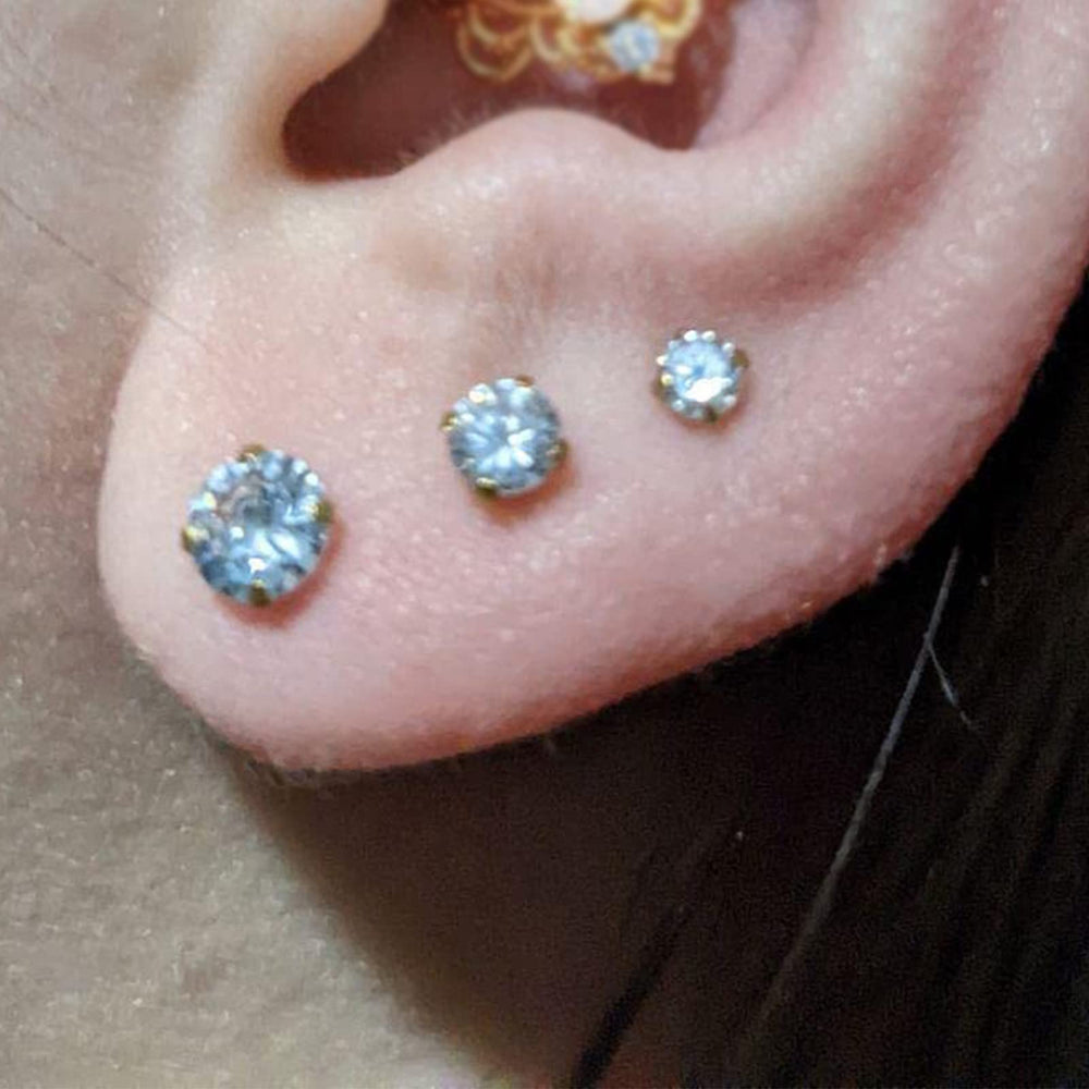QWALIT petit anneau piercing helix-cartilage, option légère pour varier les looks.