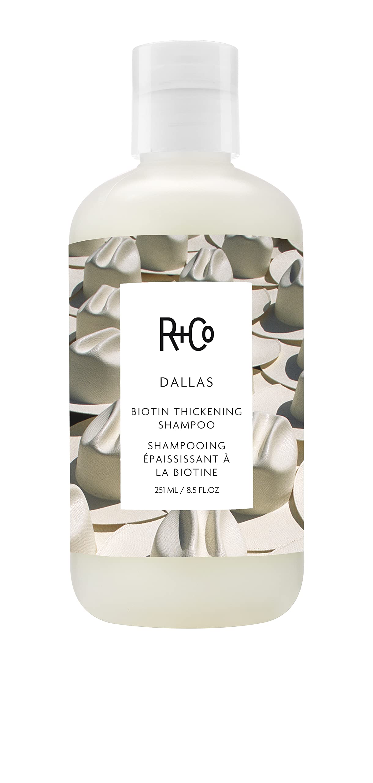 R+Co Dallas shampoing épaississant, bouteille élégante, apporte volume aux cheveux fins.
