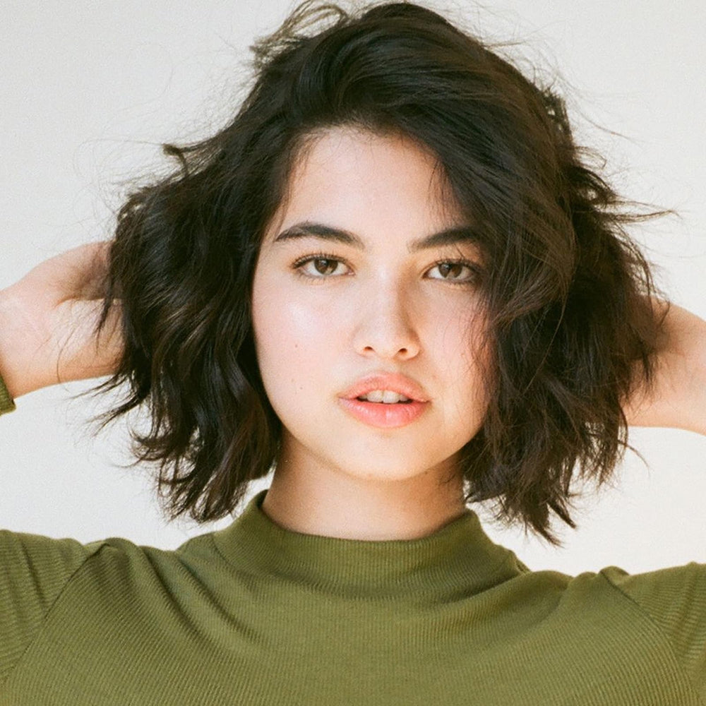 R+Co Dallas cheveux volumineux et brillants après utilisation.