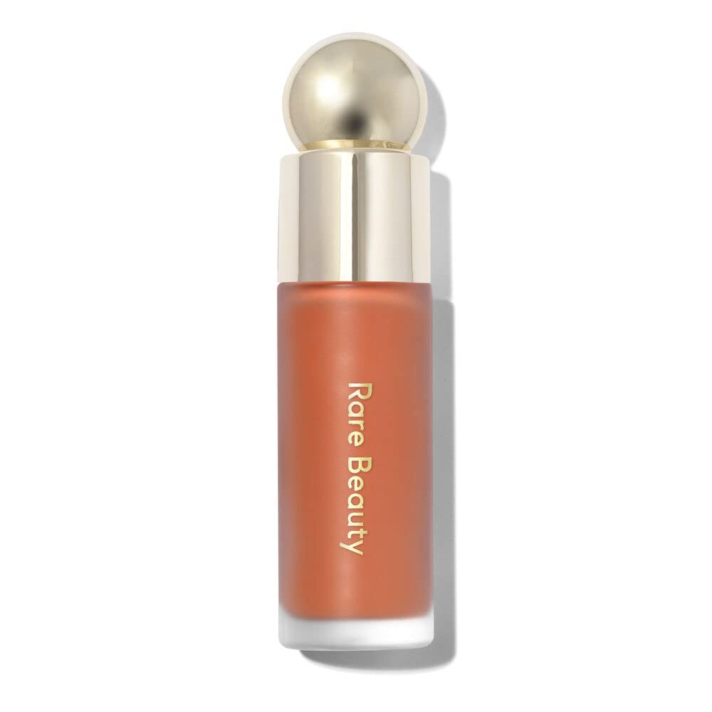 Rare Beauty Joy, flacon de rouge liquide, éclat léger et naturel.