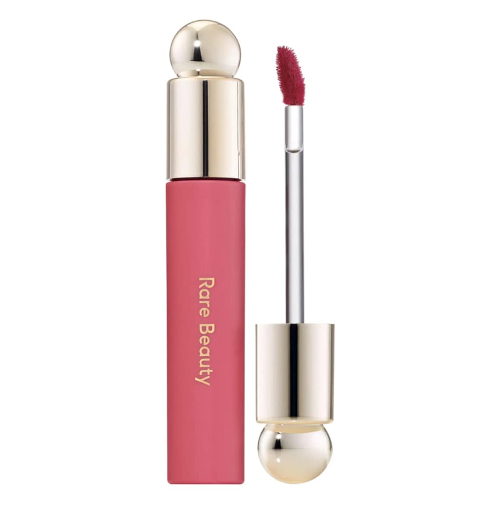 Rare Beauty Soft Pinch Tinted Lip Oil Wonder – bouteille élégante, hydratation durable et éclat teinté.