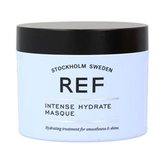 REF Masque hydratant intense dans sa bouteille, nourrissant les cheveux et protégeant leur couleur.