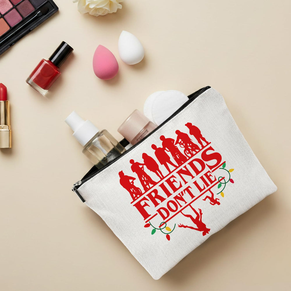 Repnalm Friends Makeup Bag – intérieur spacieux pour maquillage et accessoires lors des voyages.