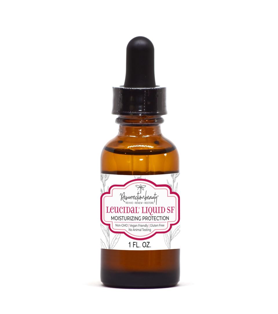 RESURRECTIONbeauty Leucidal Liquid SF – bouteille claire montrant le produit et sa protection légère pour soins faits maison.