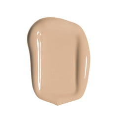 Fond de teint Revlon, texture crème légère pour une application homogène.
