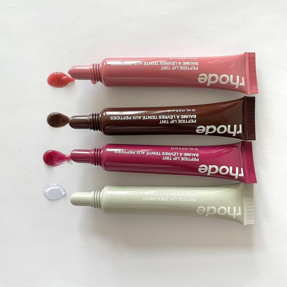 Rhode Gloss Lip Tint emballage compact Toast, pratique à emporter.