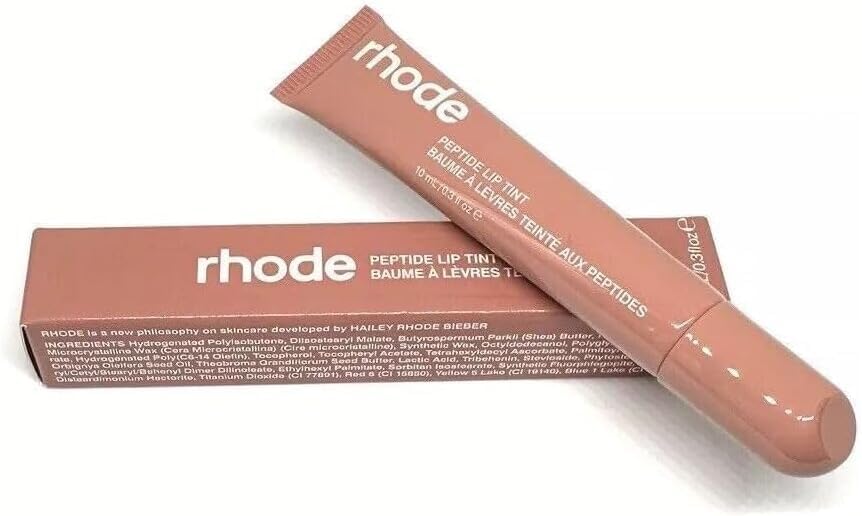 Rhode Gloss Lip Tint teinte transparente Toast pour un look naturel et léger.