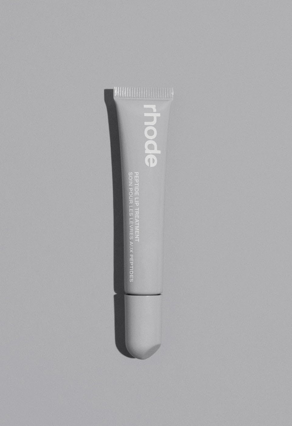 Soin des lèvres Rhode sans parfum, tube portable, hydratation durable