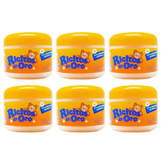 Gel coiffant Ricitos de Oro Camomille en flacon, texture légère pour coiffage facile.
