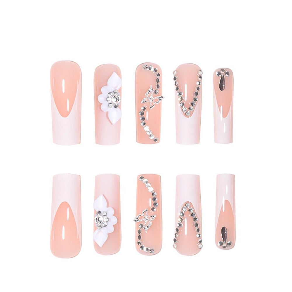RikView ongles adhésifs blancs brillants avec motifs fleurs 3D.