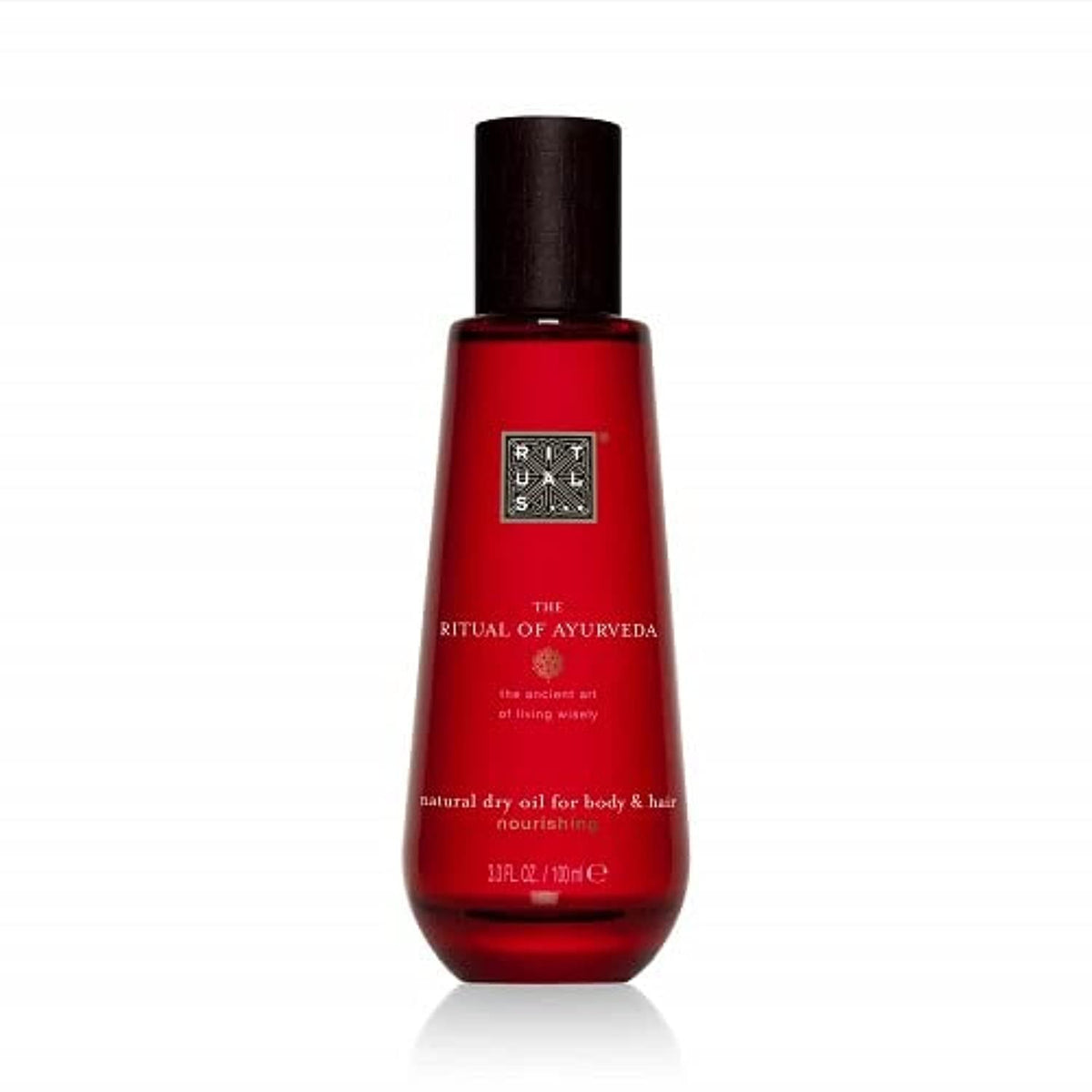 Huile sèche VATA de RITUALS dans sa bouteille, nourrissante pour peau et cheveux.