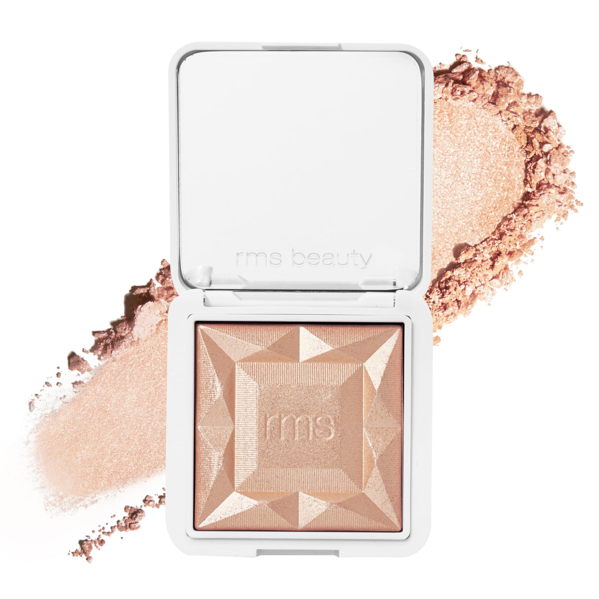 RMS Beauty Hydra Dew Luminizer dans son compact rechargeable pour une lueur naturelle durable.