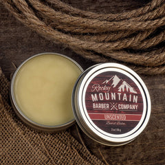 Rocky Mountain Barber Company Baume barbe – emballage aluminium portable pour voyage.