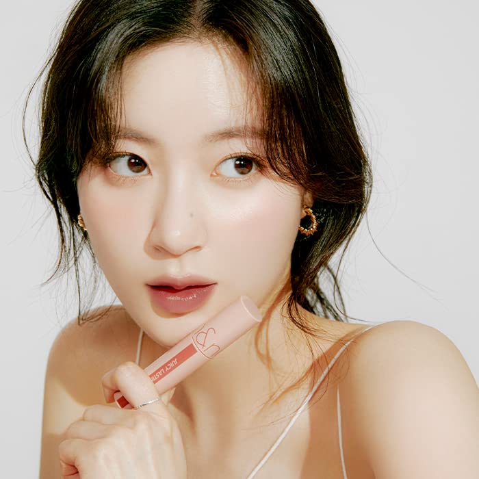 rom&nd Juicy Lasting Tint #23 Nucadamia brillance élégante pour lèvres bien hydratées.