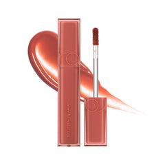 romnd TEINT AQUEUX DEWY·FUL 02 PÊCHE SALÉE — bouteille, brillance durable et hydratation légère.