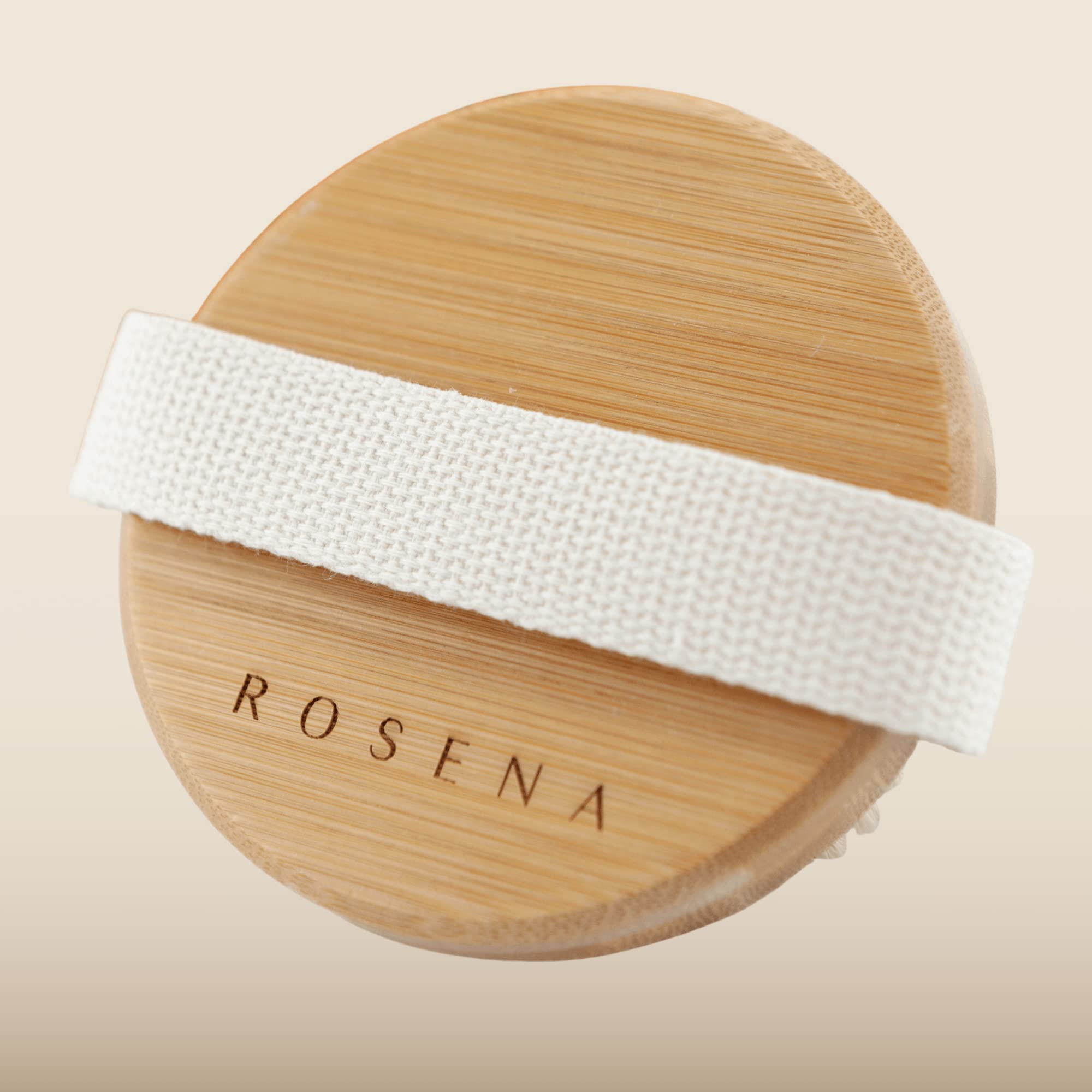 Rosena brosse-corps avec poignee integree favorisant un massage naturel.