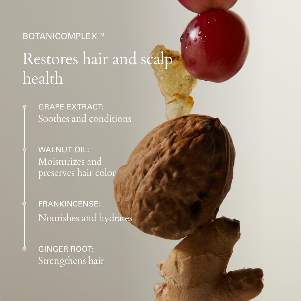 Application après shampooing: pinceau ou main appliquant le masque sur les longueurs