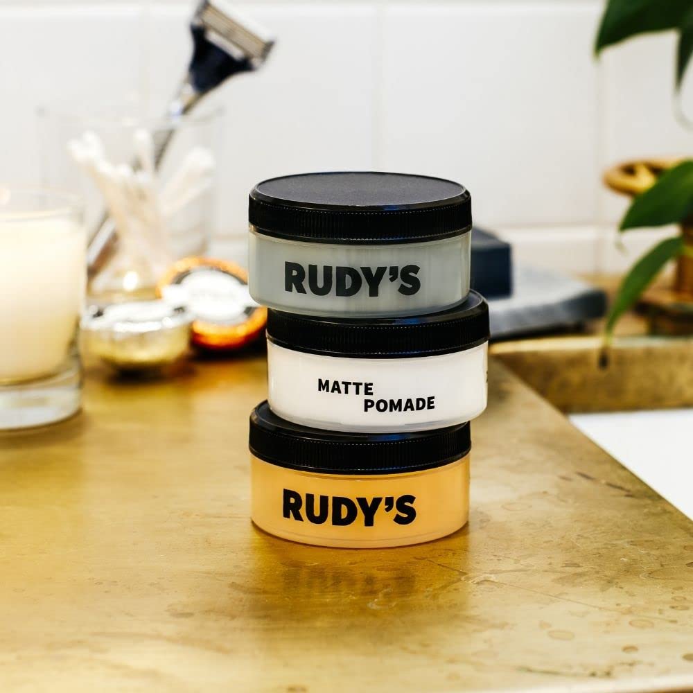 Rudy's Pâte Argileuse Coiffante, convient à tous types de cheveux pour hommes et femmes.