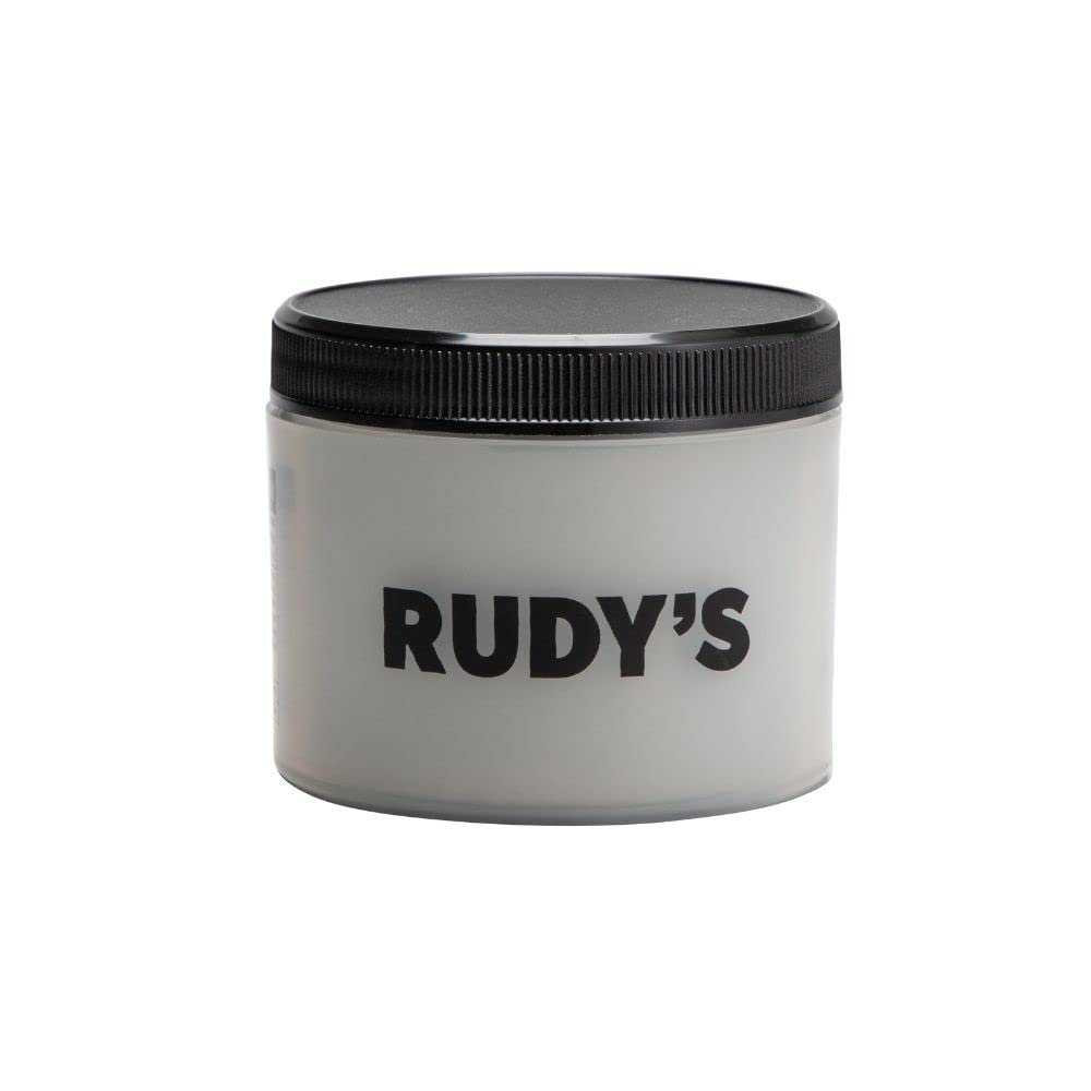 Rudy's Pâte Argileuse Coiffante, flacon visible, offre une tenue puissante et un fini naturel.