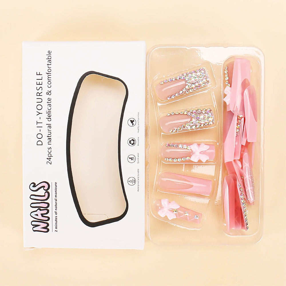 Détails strass et noeud sur les ongles RUOKEXIN.