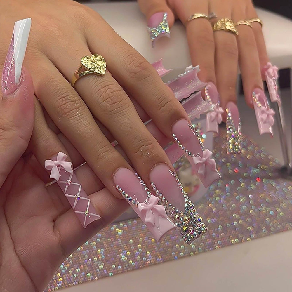 Ongles RUOKEXIN presse carré rose avec strass pour une manucure rapide.