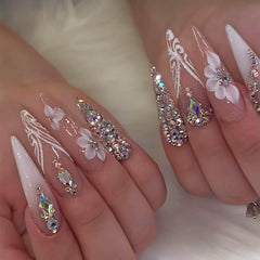 Ongles RUOKEXIN stiletto blancs en ombre, look élégant et tenue longue.