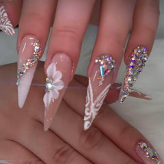 Ongles RUOKEXIN avec strass design glamour et finition soyeuse.