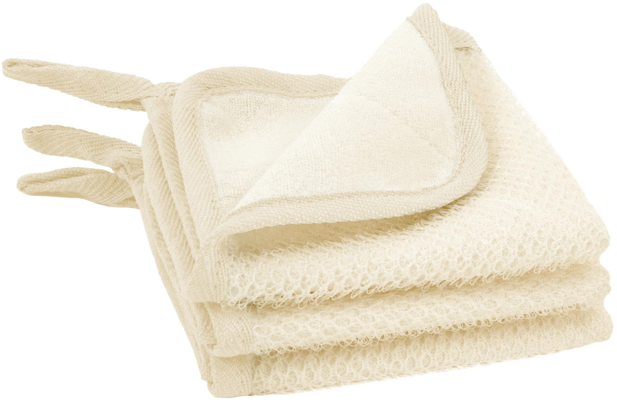 Gant exfoliant double-face S&T INC. visage et corps pour exfolier en douceur.