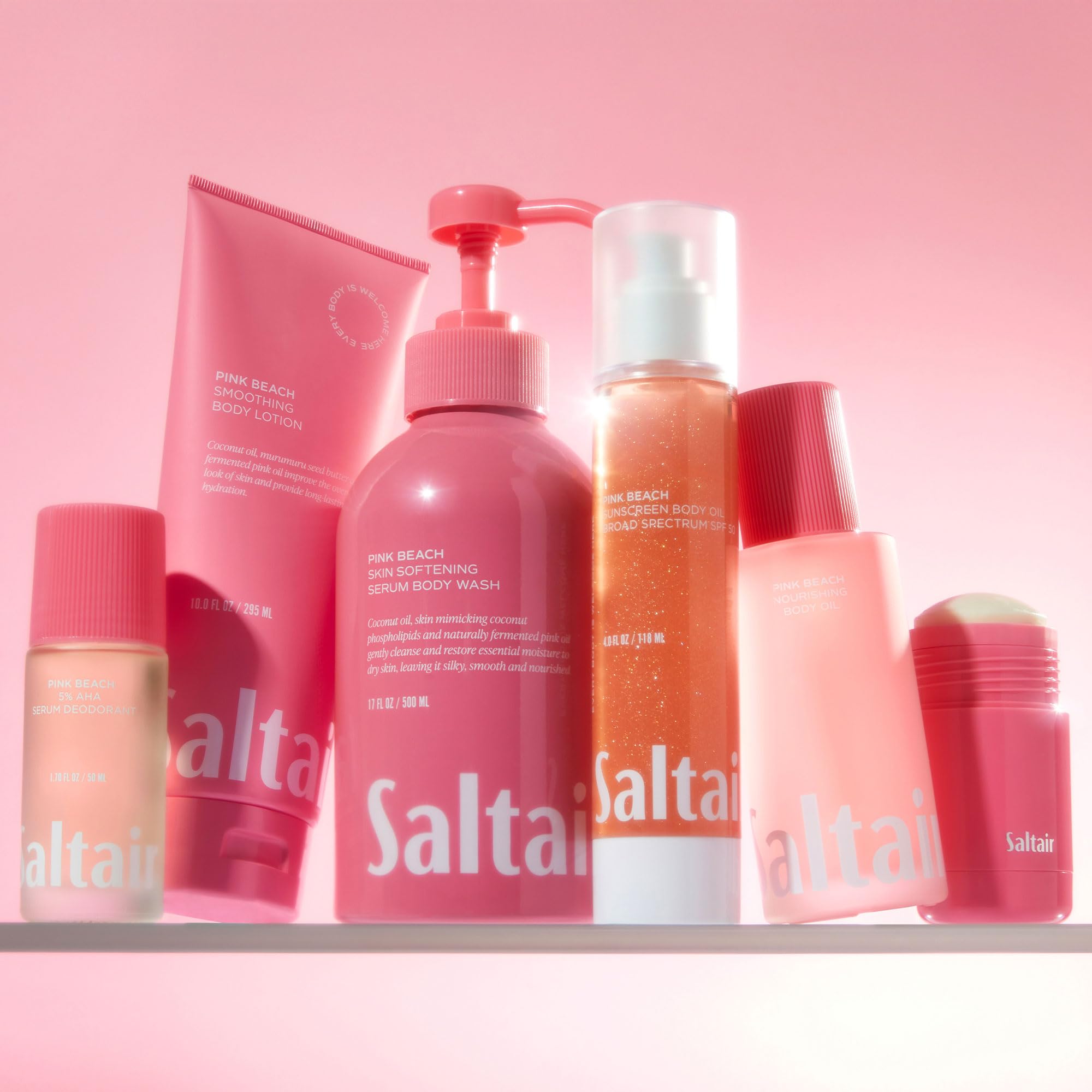 Flacon pompe Saltair rose plage 118 ml parfum subtil et hydratation légère.