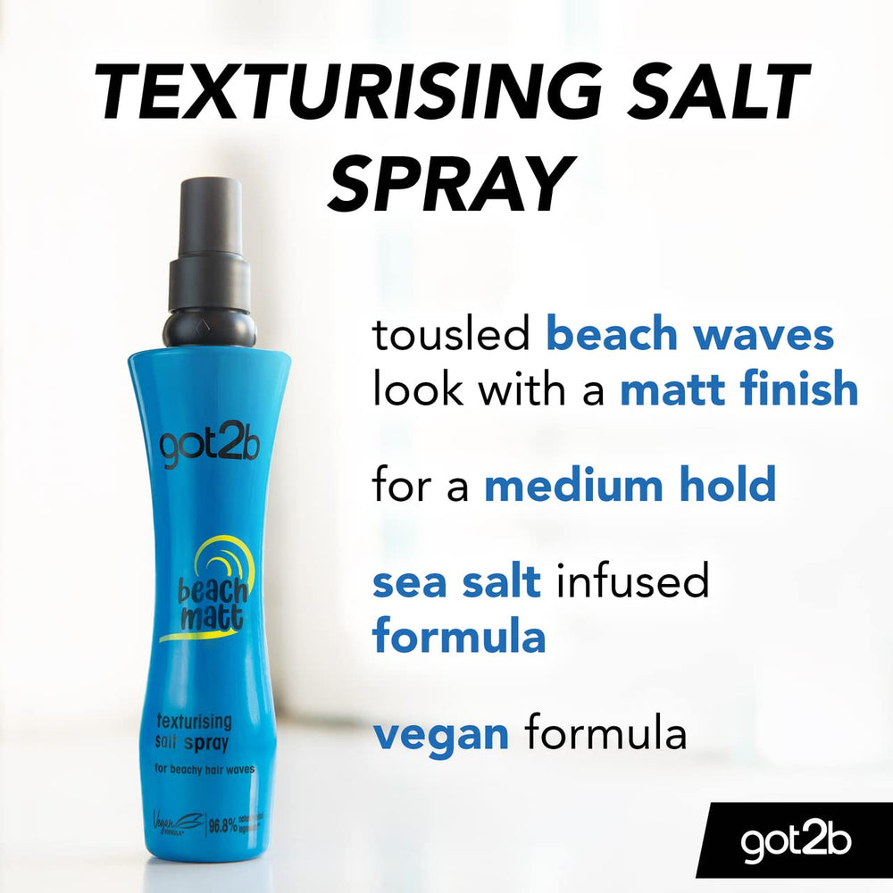 Schwarzkopf Got2b Spray salé, mains en action pour texture.